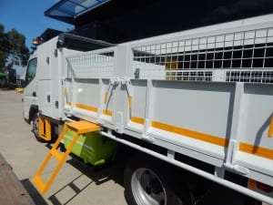 Hort tipper with drop down ladder and platform